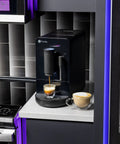 Game Changer Automatic Espresso Machine Packing Built In Milk Frother One Touch Brew Under Ninety Seconds in a modern kitchen.