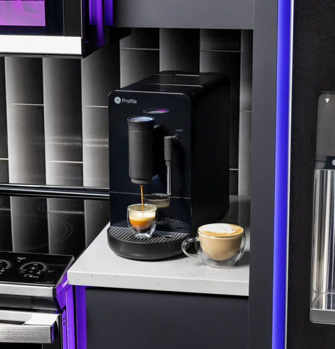 Game Changer Automatic Espresso Machine Packing Built In Milk Frother One Touch Brew Under Ninety Seconds in a modern kitchen.