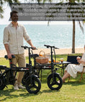Powerful Folding Electric Bike With 800W To 1200W Peak Motor For Dope City Commutes 23 MPH Top Speed Dual Suspension on grass by beach