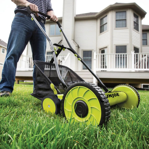 Manual Push Reel Lawn Mower With 20-Inch Cutting Width, 9-Position Height Adjustment, 8.5-Gallon Grass Catcher, Lightweight Eco Friendly Yard Care Machine For Quiet, Gas-Free Mowing And Easy Lawn Maintenance, used on a home lawn