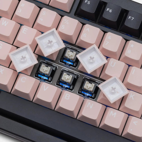 Compact Wireless Mechanical Keyboard With Tri Mode Connectivity And A Slick Dot Matrix Screen Plus Custom Volume Knob For Hella Smooth Typing Vibes And Epic Gaming Sessions Powered By Massive 10000Mah Battery showing pink keys and white keycaps.