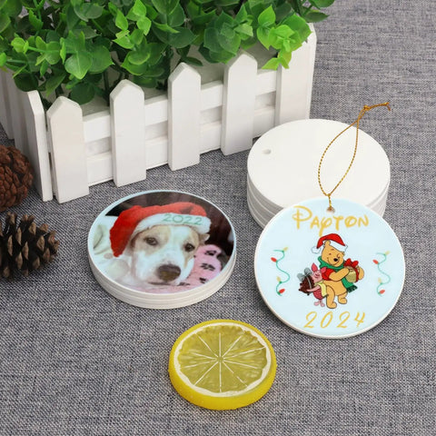 40 Pieces Sublimation Ceramic Ornaments Blanks With Holes 2.95 Inch Round White Porcelain Discs For DIY Crafts Parties showing printed designs