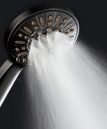 High Pressure Handheld Shower Head With Six Settings, Extra Long Six Foot Hose And Bracket, Oil Rubbed Bronze Finish spraying water