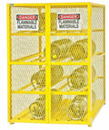 Rugged Built Like A Tank Horizontal Gas Cylinder Storage Cabinet With Expanded Metal Ventilation And Safety Yellow Powder Coat For Flammable Materials And 12 Tank Capacity containing gas cylinders.