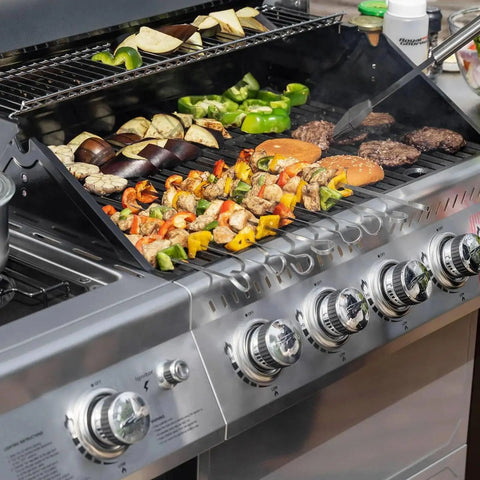 Open gas grill with assorted vegetables and meat cooking, compatible with Universal AA Battery Push Button Igniter For Gas Grills Replacement 7 Outlet Rotary Ignition Mount Plug And Play Easy Install Compatible With Char Broil Nexgrill Brinkmann Blackstone Griddle.