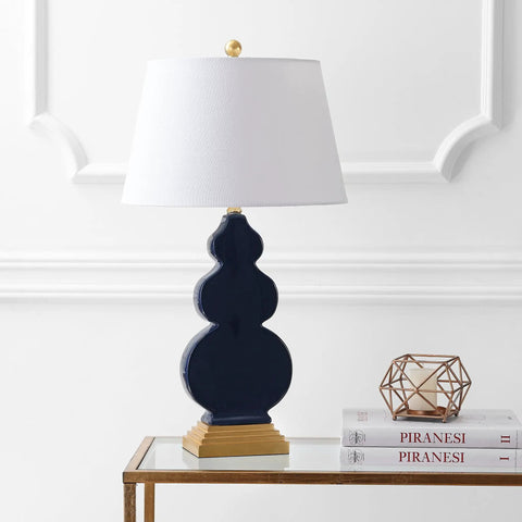 Totally Chic Navy Blue And Gold Ceramic Table Lamp With White Linen Shade, Sleek Mid Century Triple Gourd Design For Bedroom Or Office, 29 Inch Tall Bedside Lamp With LED Bulb Included on a table