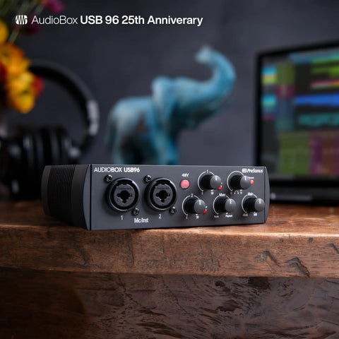 AudioBox 96 25th Anniversary USB Audio Interface With 2 Channel USB 2.0 Class A Mic Preamps on wooden surface