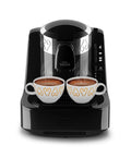 Automatic Turkish Coffee Maker With Self Clean One Touch Brew And Easy Pour Altitude Auto Detect Technology For Consistent Flavor At Any Elevation USA 120V UL Listed Black And Silver brewing two cups of Turkish coffee with perfect foam.