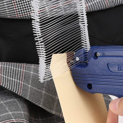 2 Inch Tagging Gun Fasteners 5000 Pack Pro Grade Heavy Duty Clothing Tag Barbs Attachments For All Standard Price Tag Guns shown in use
