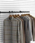 2 Pack Slatwall U Shaped Rectangular Tubing Hangrail 16x12 Inch For Retail Display And Home Apparel Storage Black Beefy Steel Built To Endure Daily Use With Powder Coated Steel And A Sleek Black Finish For Durable Retail And Home Storage displaying shirts on hangers against a slatted wall