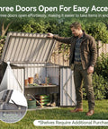 Man opening Heavy Duty 35 Cu Ft Outdoor Storage Box With Hydraulic Lift Lid And Lockable Doors, showcasing interior space.