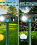 Solar Powered Ultrasonic Pest Deterrent For Your Yard And Garden, Motion Sensor Outdoor Light That Fends Off Raccoons, Squirrels, Rabbits, Cats, Dogs And Skunks, IP65 Weatherproof Animal Repeller mounted outdoors in sun and rain