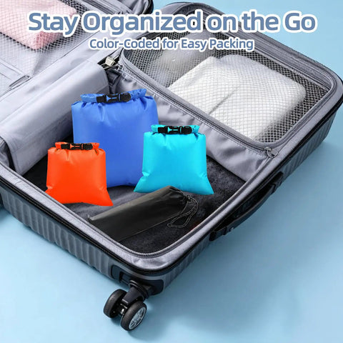 Six Pack Wet Dry Bags Set For Beach And Travel Waterproof Pouches with roll top closure inside an open suitcase.