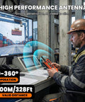Orange 8-button wireless crane remote transmitter with 12V receiver held by operator.