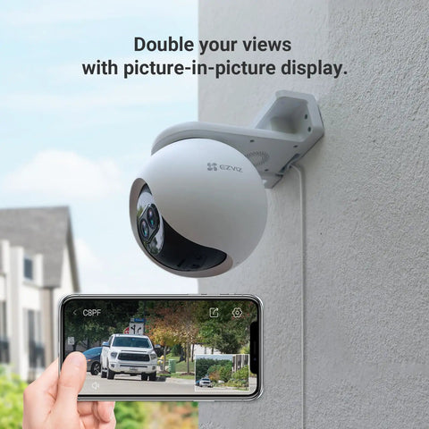 Dual Lens 1080P Outdoor Security Camera With Color Night Vision mounted outside with smartphone view