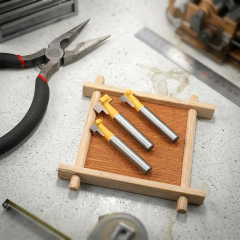 Top Shelf Kickass Keyhole Router Bit Set Includes 3 Piece T Slot T Track Bits With One Quarter Inch Shank on display.