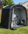 Mega Roomy Outdoor Bike Storage Tent Shed 82 By 59 By 73 Inch Portable Waterproof 210D Oxford PU4000 with bicycle inside