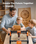 Front view of ACMER S2 laser engraver on a table with orange and black frame engraving a wolf design on wood