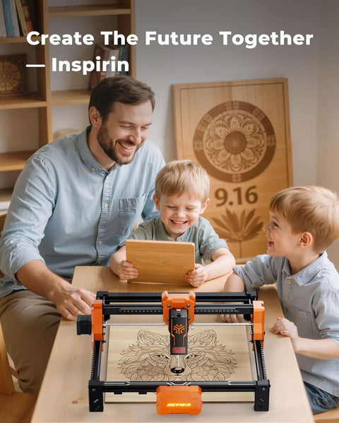 Front view of ACMER S2 laser engraver on a table with orange and black frame engraving a wolf design on wood