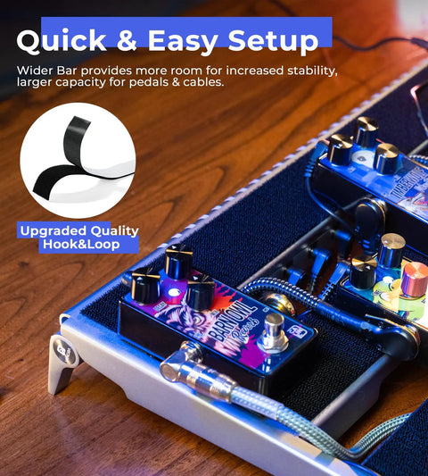 Close-up of Guitar Pedalboard With Isolated Power Supply, PD-M Aluminum One-Piece Bent Frame, showing pedals and cables on surface.