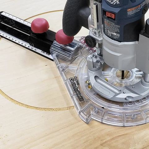 Universal 7 Inch Router Base Plate With Adjustable Swivel Wings And Clear Top For Sharp Vision in use with router and template on wood.