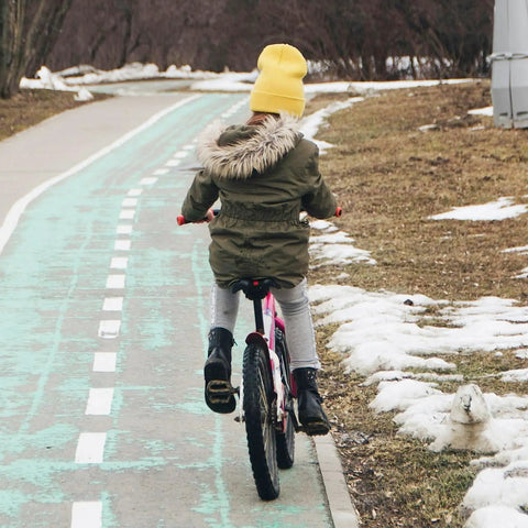 Child riding a bike with new 18x1.75-2.125 bike inner tubes two pack, replacement tubes for city, road, mountain, and kids bikes.