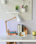 100 Pack Self Adhesive Sneeze Guard Clips No Fuss Peel And Stick Brackets For Clear Acrylic Sign Holders on a descriptive home office desk.