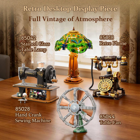 Retro Desktop Display Piece featuring a Retro Buildable Desk Fan Model For Adults Dope Green Display Piece With Motorized Oscillation Realistic Grille Weighted Base Bronze Blades Vintage Inspired Decor alongside vintage lamp, phone, and sewing machine on a wooden table.