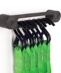 Hook Rail Strap Organizer 2 Pack For Easy Tie Downs Ratchet And Bungee Cord Storage in use with green straps on wall