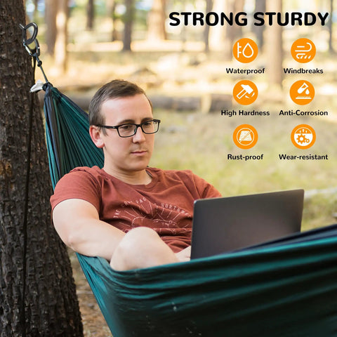 Person in hammock using laptop, with infographic showing features like waterproof and rust-proof. Outdoor setting, trees in background.