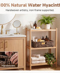 Large Wicker Storage Basket For Shelves And Pantry In Brown Water Hyacinth, 1 Pack displayed on a bathroom shelf with toiletries.