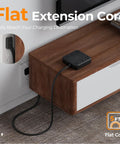 Heavy Duty Surge Protector Power Strip With An Incredibly Flat Plug 5 Foot Extension Cord In Black on a wooden table.