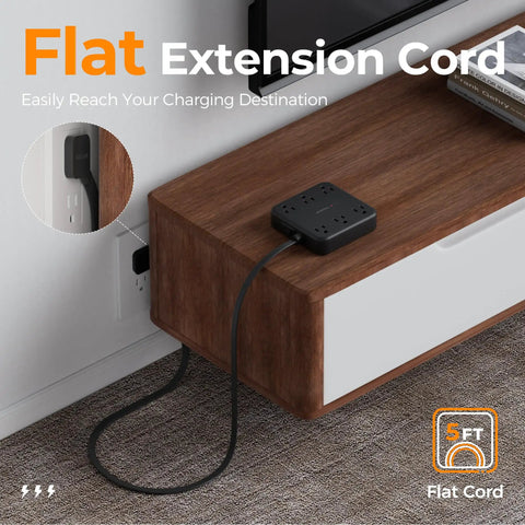 Heavy Duty Surge Protector Power Strip With An Incredibly Flat Plug 5 Foot Extension Cord In Black on a wooden table.