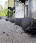 Sediment Filter Sock For Erosion Control And Storm Drain Protection, Highly Efficient Debris Barrier in use by a storm drain