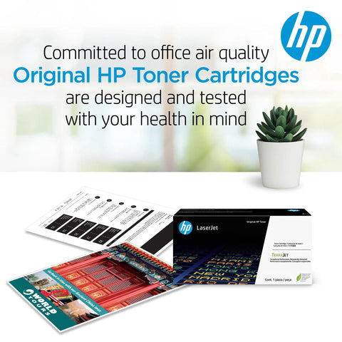 Box of Original HP Toner Cartridges next to color printouts and plant, promoting air quality commitment and health in office.