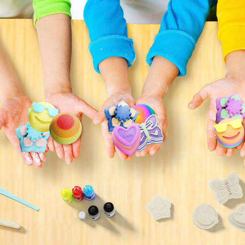 Totally Fun Bath Bomb Making Kit For Kids Turns Bath Time Into A DIY Science Class, Makes 10 Fizzy Bombs With Colorful Molds, Surprises Inside Each Bomb, Easy At Home Spa Project For Creative Play And Mess Free Fun. Kids hold colorful bath bombs and molds