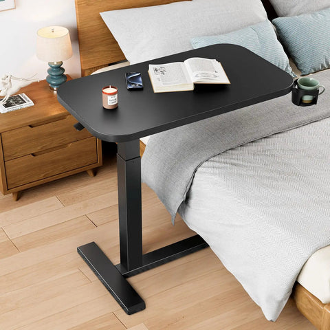 32 Inch On Wheels Overbed Desk With Cup Holder And Height Adjustable Pneumatic Lift Rolling Computer Cart beside bed