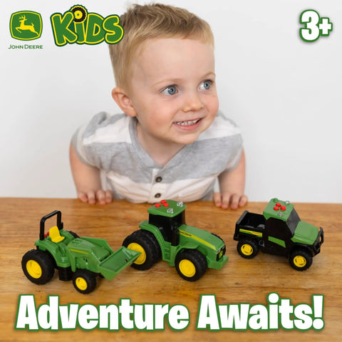 Child playing with Three Pack Farm Vehicle Set With Lights And Realistic Sounds For Kids, 5 Inch Scale Featuring 7R Tractor, 6105M Tractor Gator