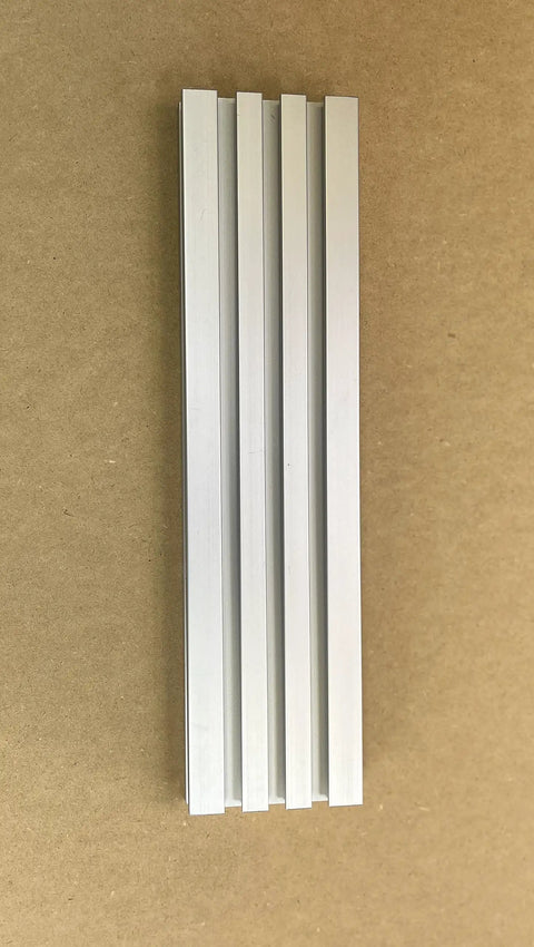 Top Shelf Heavy Duty Aluminum T Track Rail For Custom Jigs And Workbenches 32 Inch Universal Guide shown from above, five channels visible.
