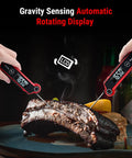 Instant Read Meat Thermometer Digital For Kitchen And Grill showing temperature on steak with 180 degree rotating screen