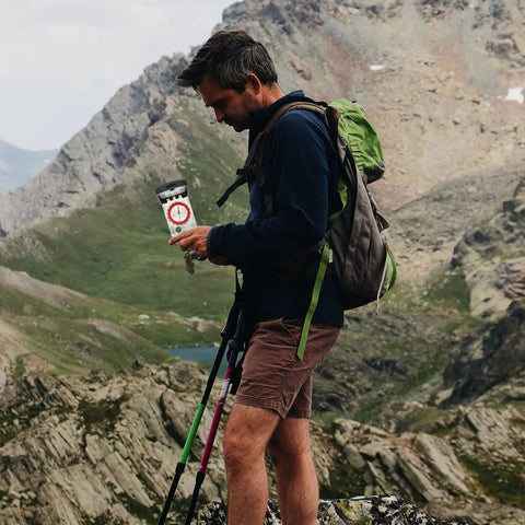 Hiker using Compact Orienteering Compass With Scale And Mirror For Precise Navigation On Hiking Camping And Trekking Trips