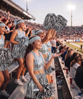 Girls wearing 73 Piece Silver Spirit Wear Kit for Girls With Bulk Pep Rally Essentials including pom poms and headbands in stadium stands.