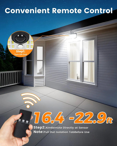 Solar Fence Lights With 526 LEDs, Motion Sensor installed on house facade, remote control in hand, lit in cool white 6000K