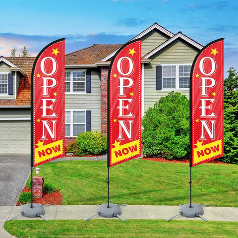 Now Open Feather Flag Pole Kit With Ground Stake Water Bag And Travel Bag displayed at a real estate open house