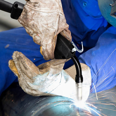 Welder using Top Tier Flexible 14A MIG Welding Torch Stinger Replacement with copper conductors for industrial work.