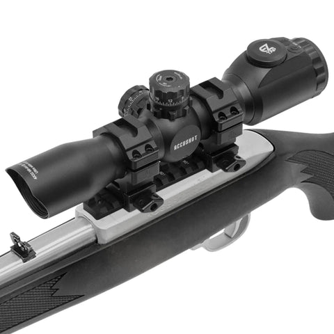 Heavy Duty Ruger 10/22 Picatinny Rail Mount With Sleek Matte Black Finish Machine Milled From Solid Aircraft Aluminum For Hassle Free Scope Alignment And Snappy Field Accuracy Made Stateside mounted with a scope on a rifle.