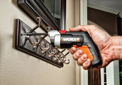 Person using 4V XTD Xtended Reach Cordless Screwdriver Pro Grade With Extending Shaft For Recessed Areas Auto Spindle Lock Offset Chuck High Capacity Lithium-Ion Battery Drives Screws Straighter With Less Slippage Red to attach wall hook rack.