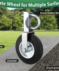 Heavy Duty Gate Wheels Two Pack Slick Support Casters For Metal Swing Gates Fits One Point Five Eight Inch To Two Inch Frames close-up of a sturdy rubber wheel on grass and concrete.