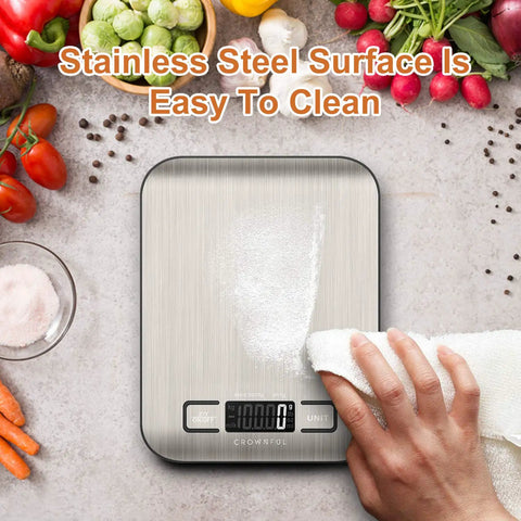 Cleaning Must Have Digital Kitchen Scale with 11 lb capacity and stainless steel surface, surrounded by fresh produce.