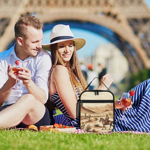 Couple at picnic with Insulated Lunch Box For Men And Women With West Desert Cactus And Cowboys Riding Horses Design Reusable Lunch Tote Bag Durable Polyester Splash Proof Ideal For Office Travel Camping And Picnics